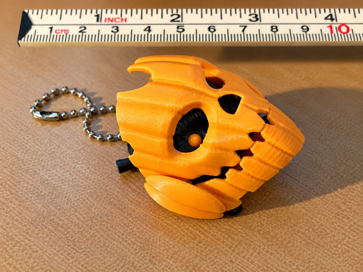 Pipecox Pumpkin Skull Articulated Fidget Keychain