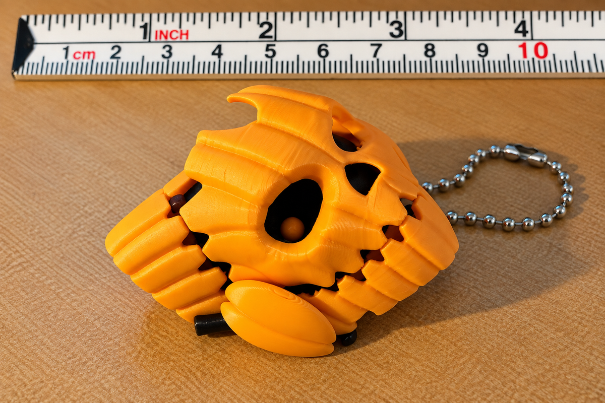 Pipecox Pumpkin Skull Articulated Fidget Keychain