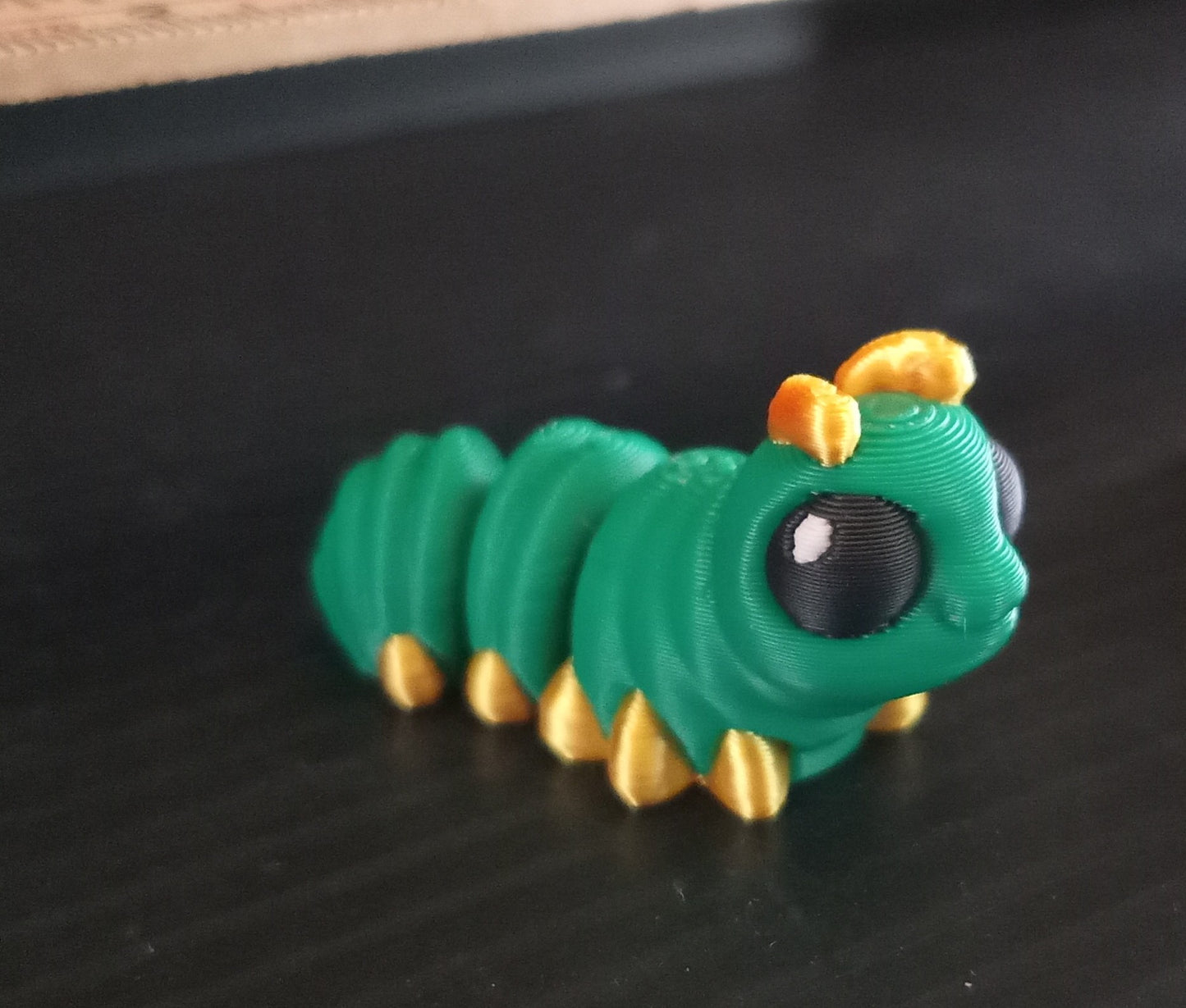 Cinderwing 3D Caterpillar Tadling – Articulated Fidget Toy (Green & Gold)